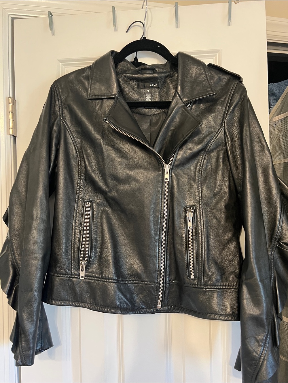 Aqua Bloomingdale’s Black 100% genuine Leather Moto Jacket with ruffle trim